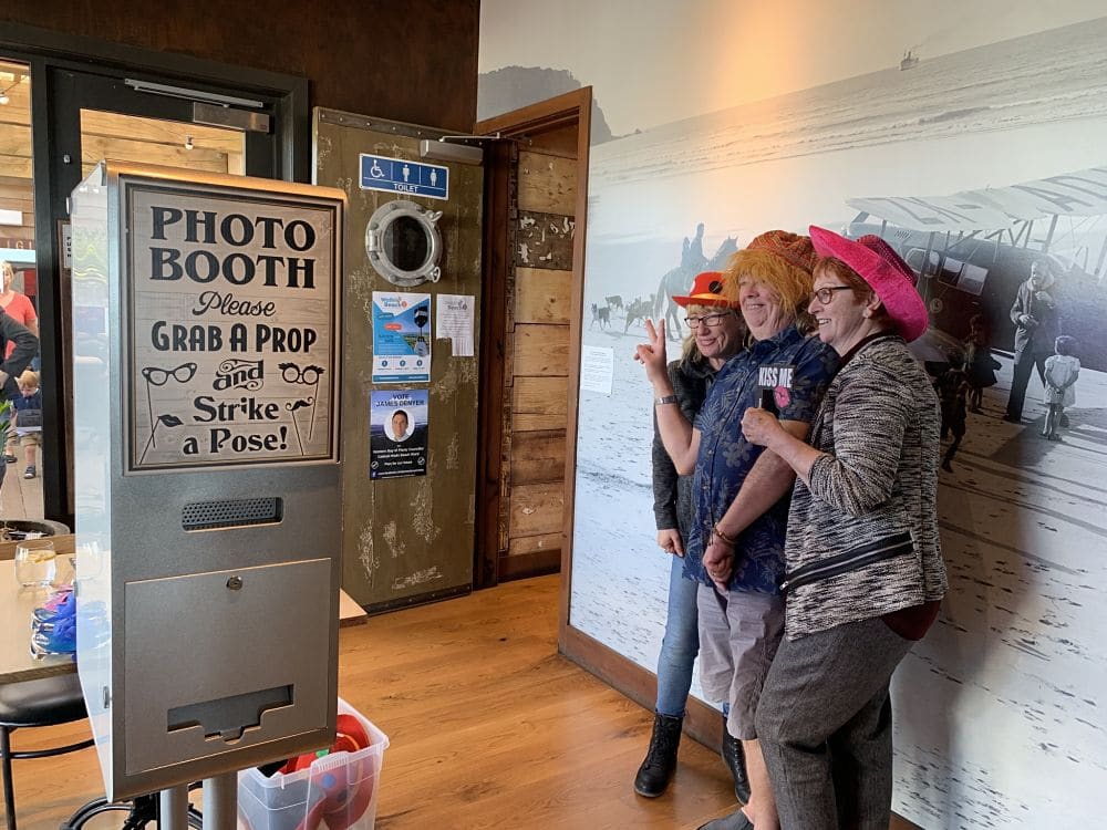 Flatwhite Waihi Beach - Guests using Photo Booth