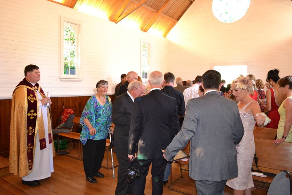 Henley Hotel - Wedding Guests In Chapel with Bishop