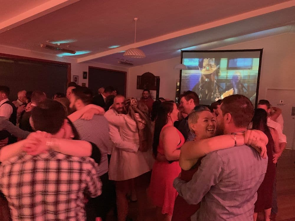 Inglewood Golf Club - Wedding guests dancing in front of DJ and Video screen