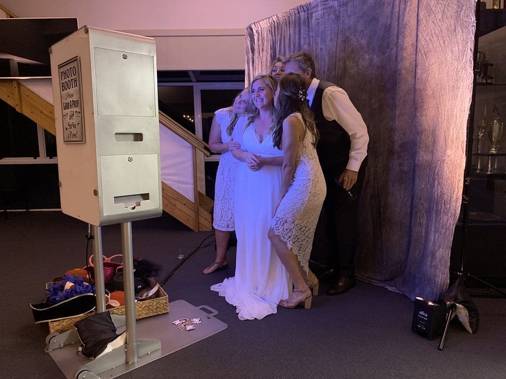 Lake Taupo Yacht Club - Bride and Guests using photo booth