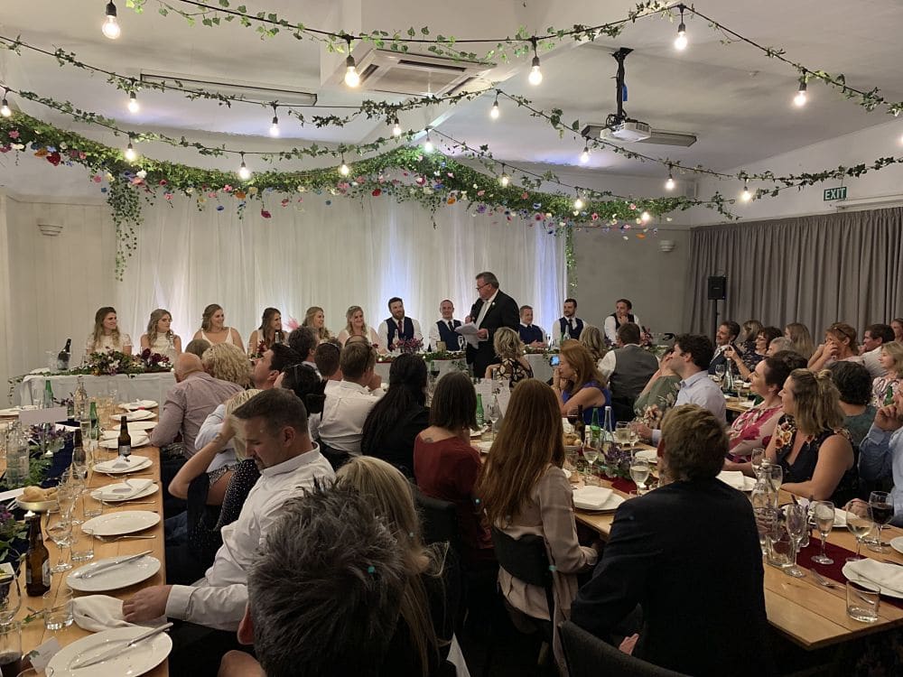 Lake Taupo Yacht Club - Wedding guests seated in reception speeches