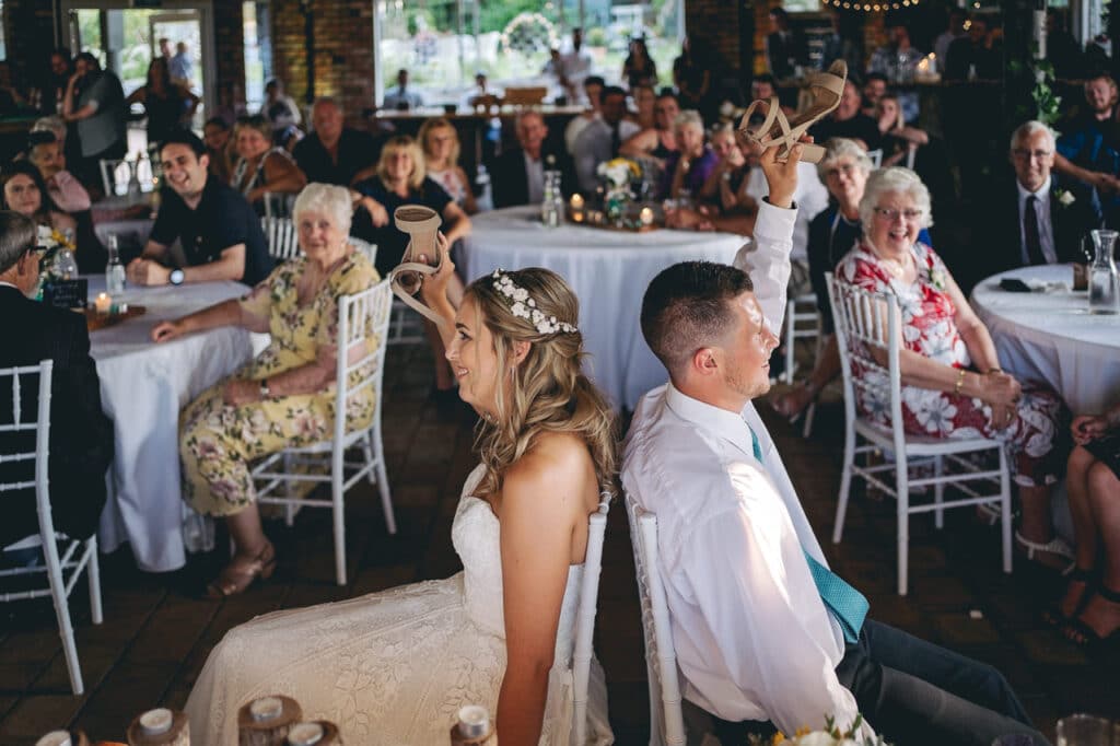 Rosenvale - Te Awamutu - Wedding Reception Bride & Groom Playing Shoe Game