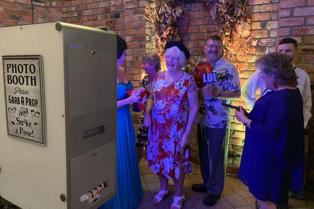 Rosenvale - Guests laughing in photo booth