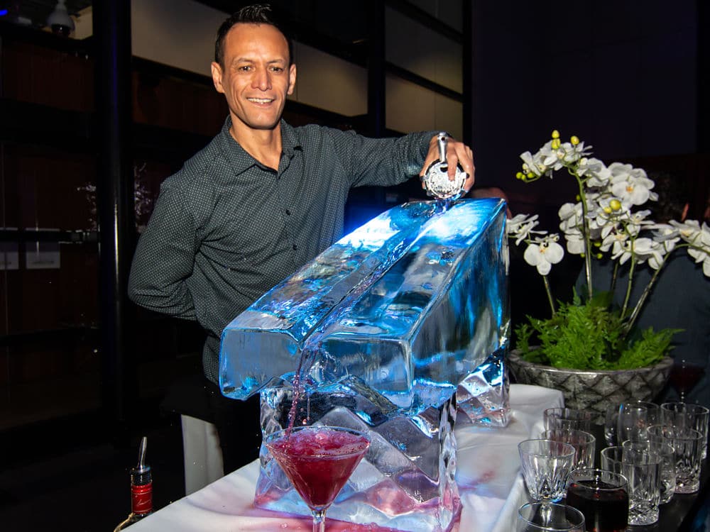 The Atrium - Bar Staff pouring drinks on ice sculpture