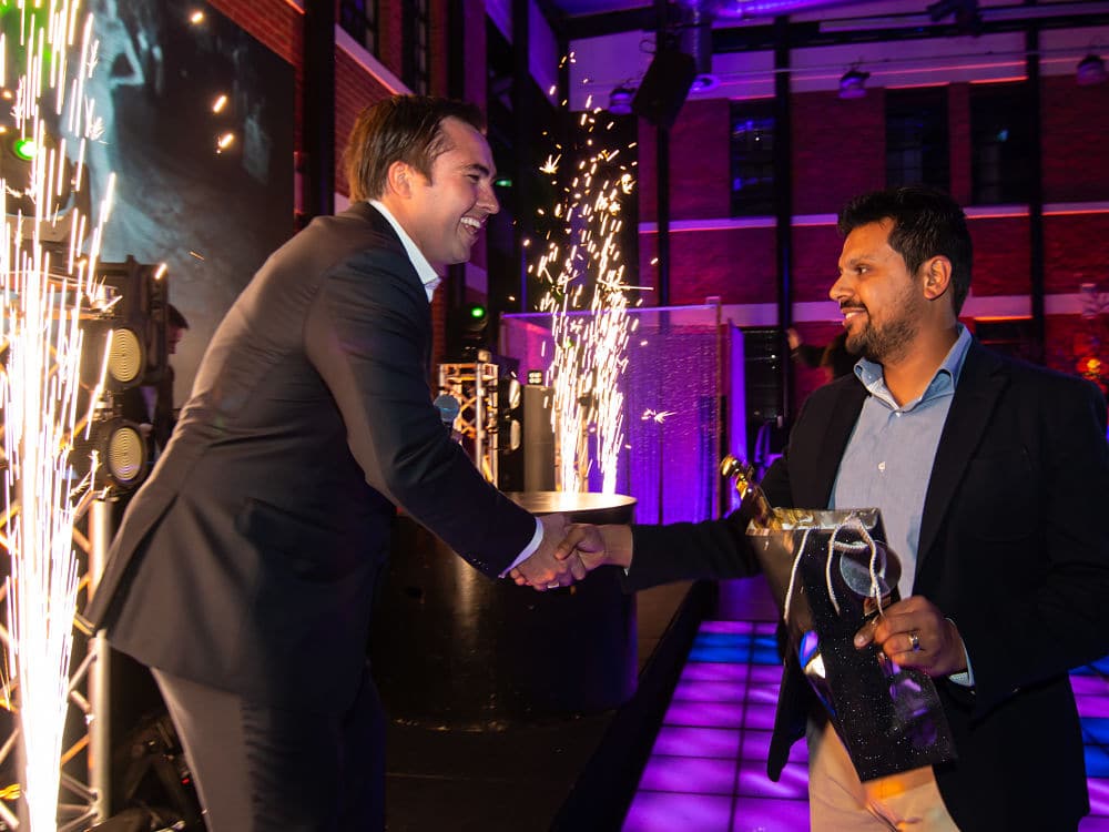 The Atrium - Guest present an award at corporate event