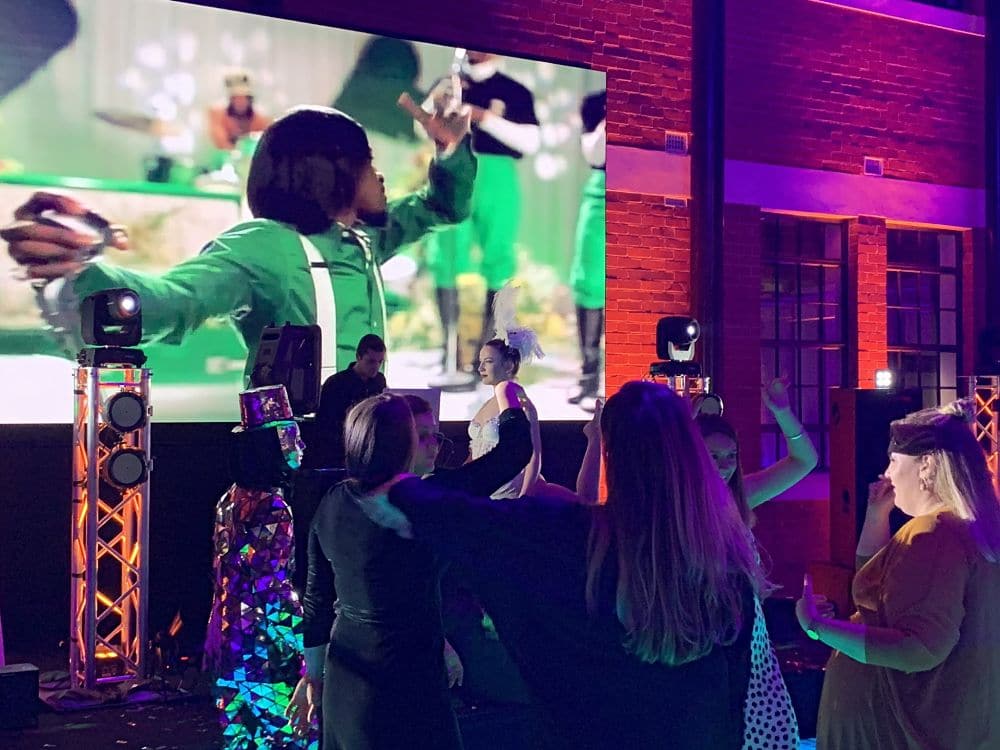 The Atrium - Guests on dance floor in front of video screen