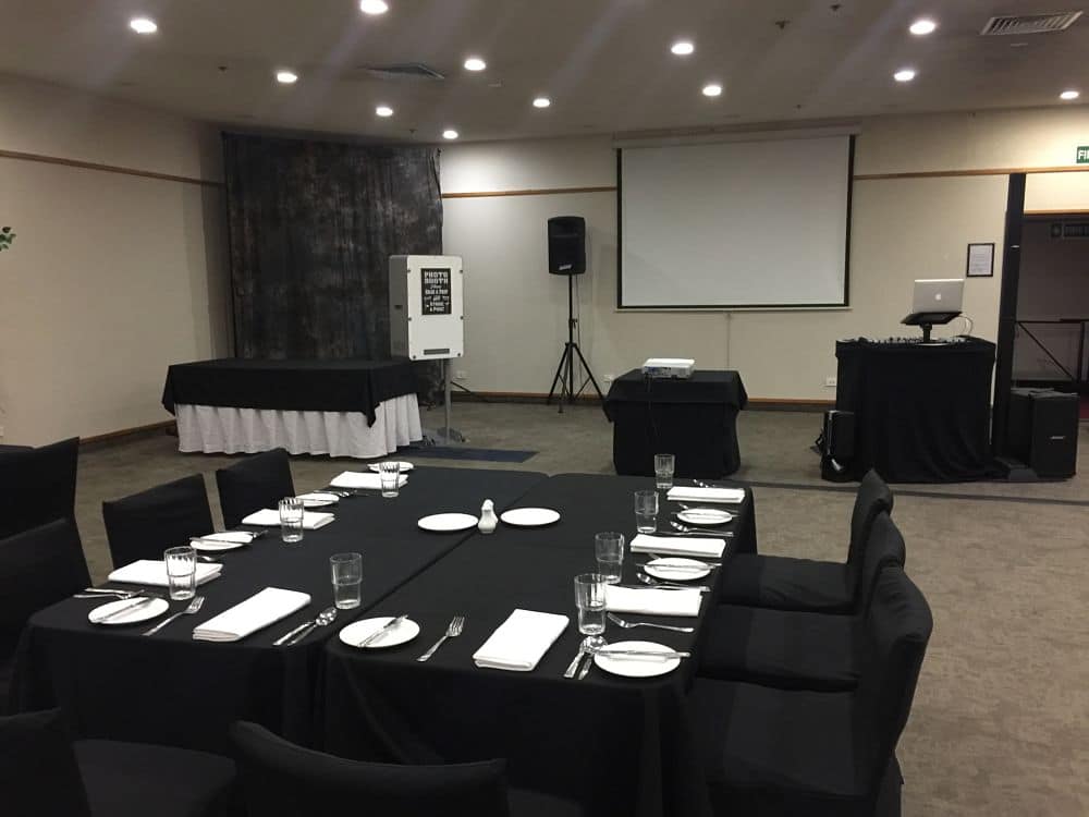 The Distinction Hotel Hamilton - Conference Room 4 Staff Christmas Party DJ Equipment and Table Setting
