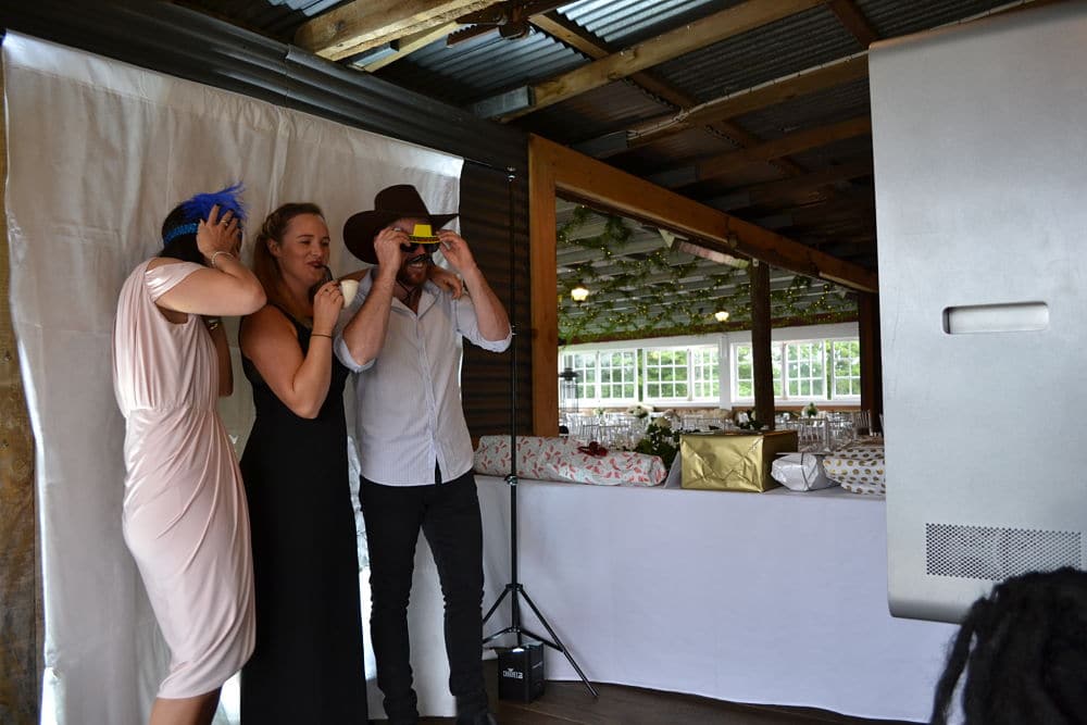 The Red Barn - Guests using photo booth
