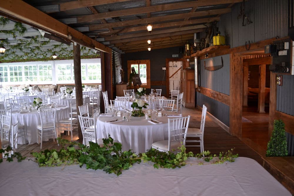 The Red Barn - Waikato - NZ - Guests tables set for a wedding