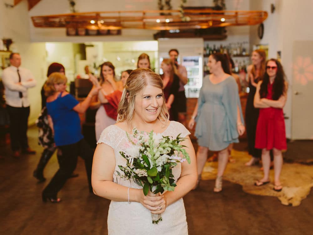Woodside Estate Wedding Reception - Bride Throwing Bouquet