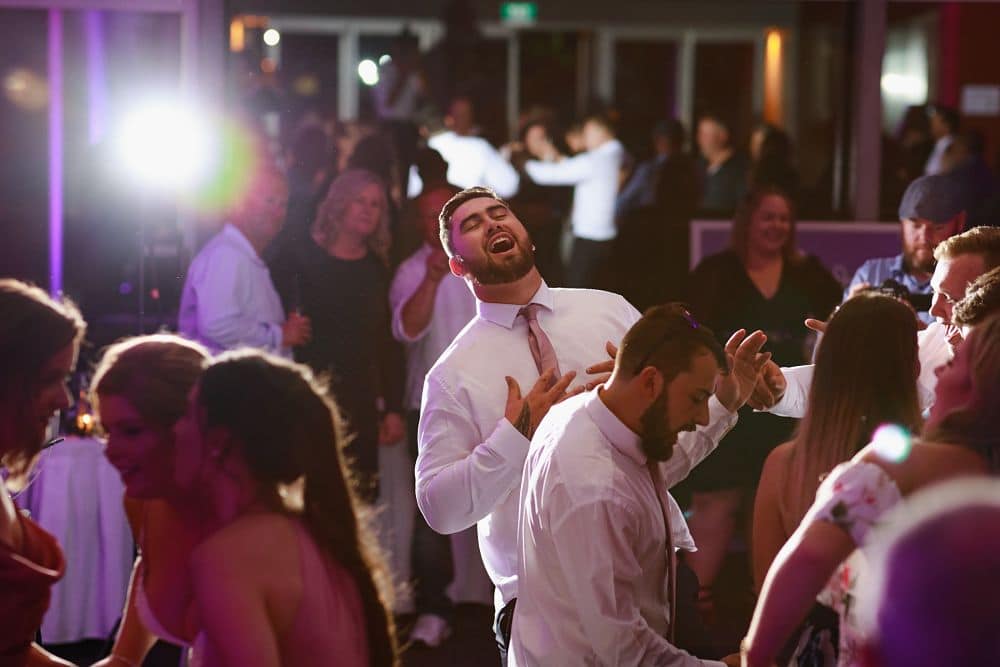 Awapuni Racing Function Centre - Groom and Guests Dancing at Wedding Reception