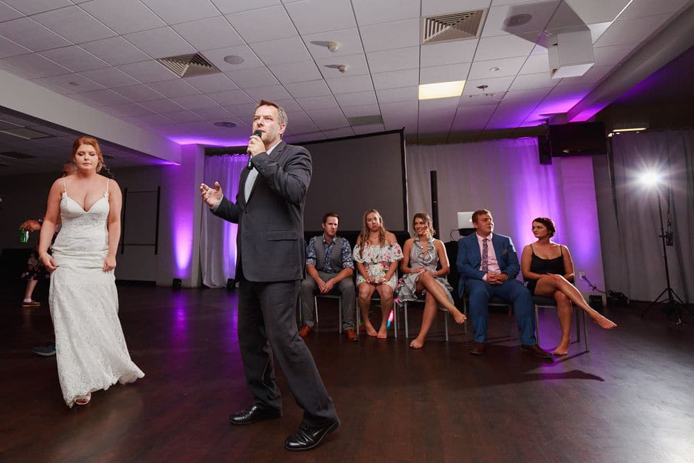 Awapuni Racing Function Centre - MC Scott with Bride and Wedding Guests about to perform Scavenger Hunt Game