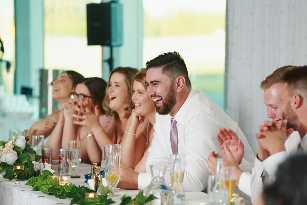 Awapuni Racing Function Centre - Bridal Party seated and laughing during speeches