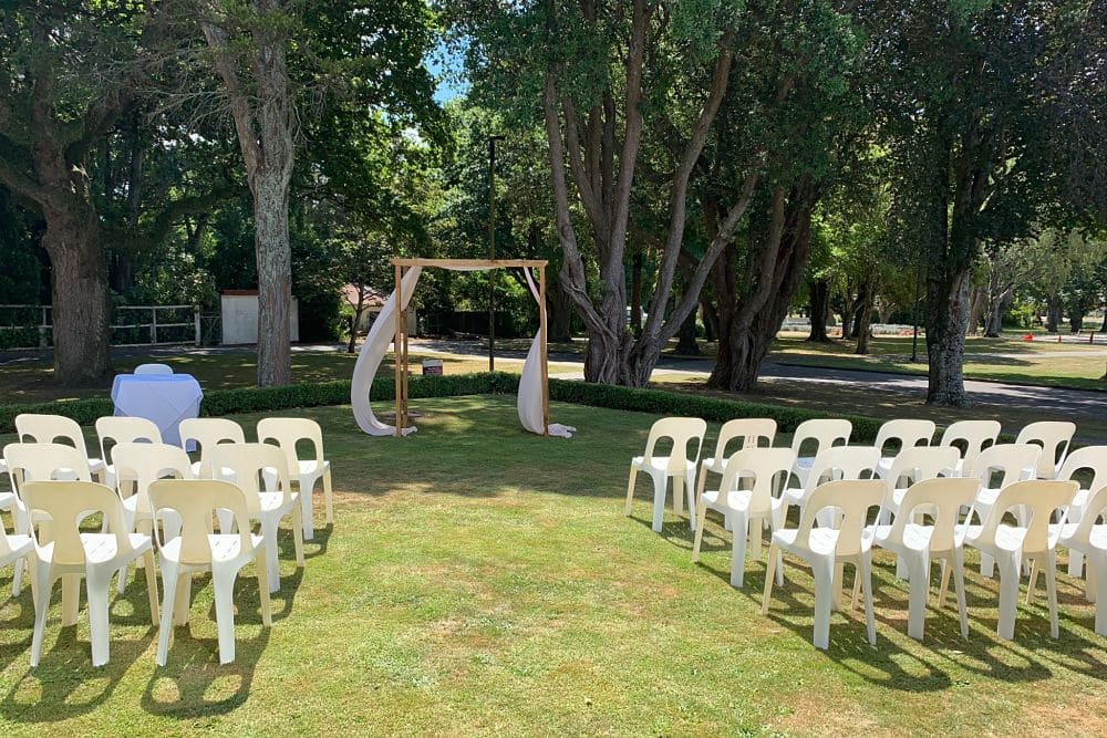 Awapuni Racing Function Centre - Wedding ceremony setting outside function room