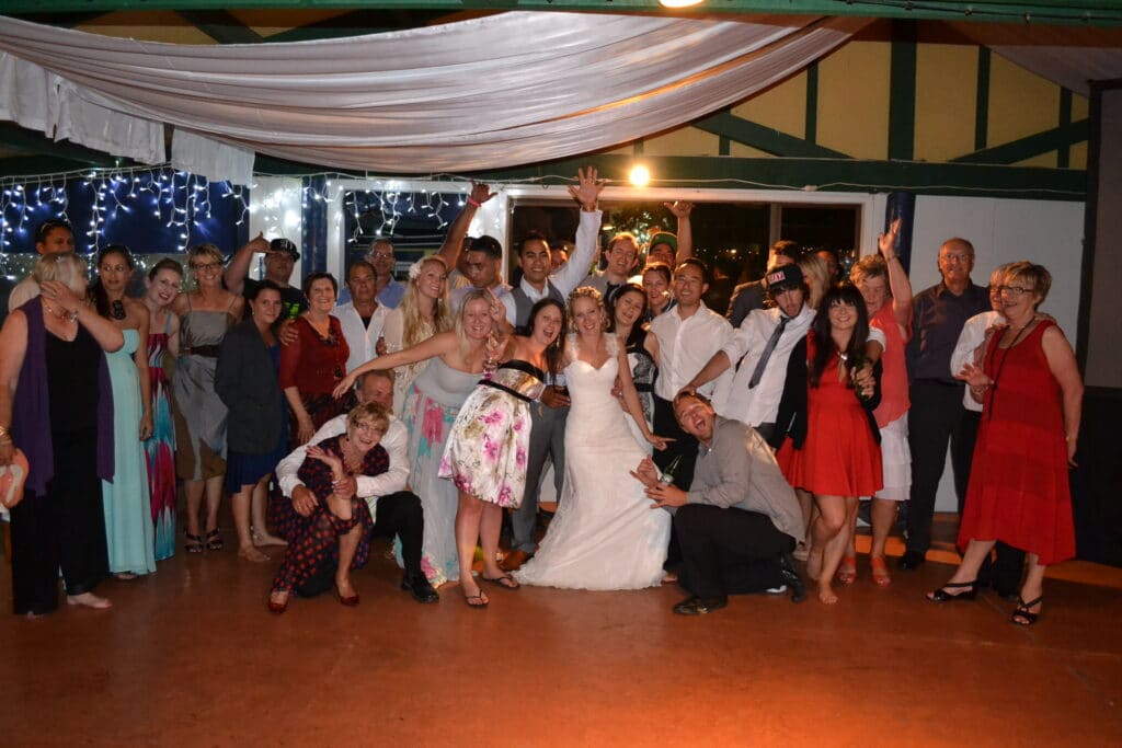 Wedding guests at the end of reception in Brookfields Vineyards cellar room