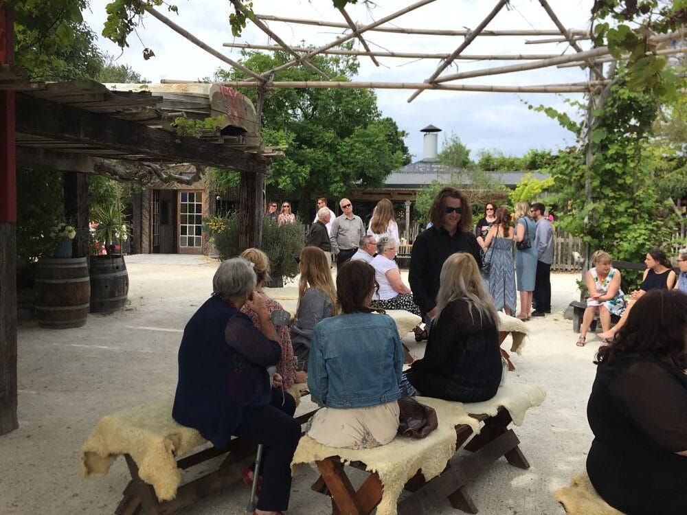 Crab Farm Winery - Wedding guests seated outside before bride arrives