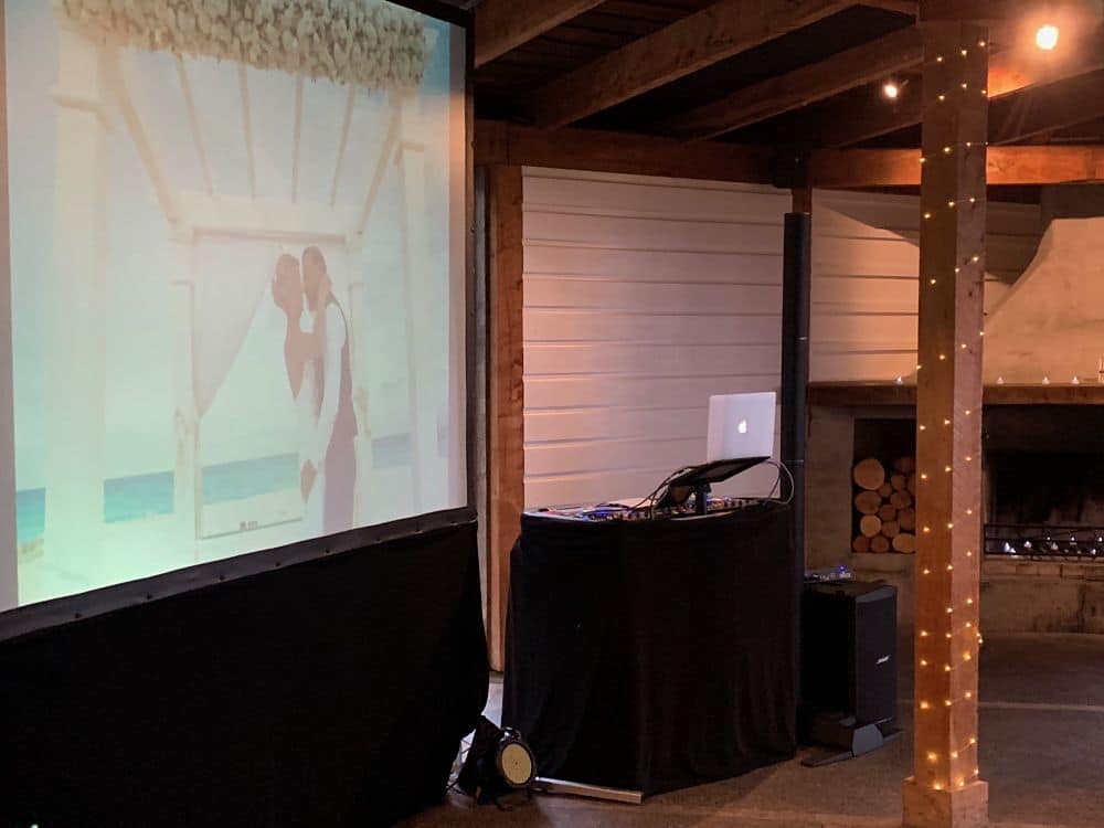 Te Awa Winery - Dj Playing bride and grooms slide show on big Video Screen